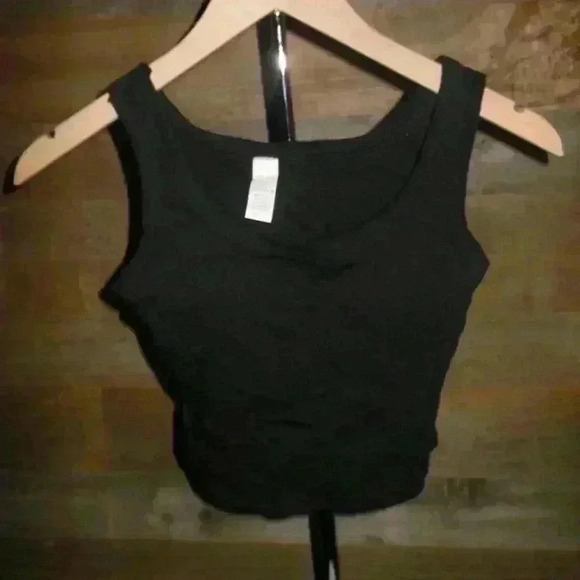 Black crop top w/ slits on sides has padding inside  - OS - Picture 1 of 3